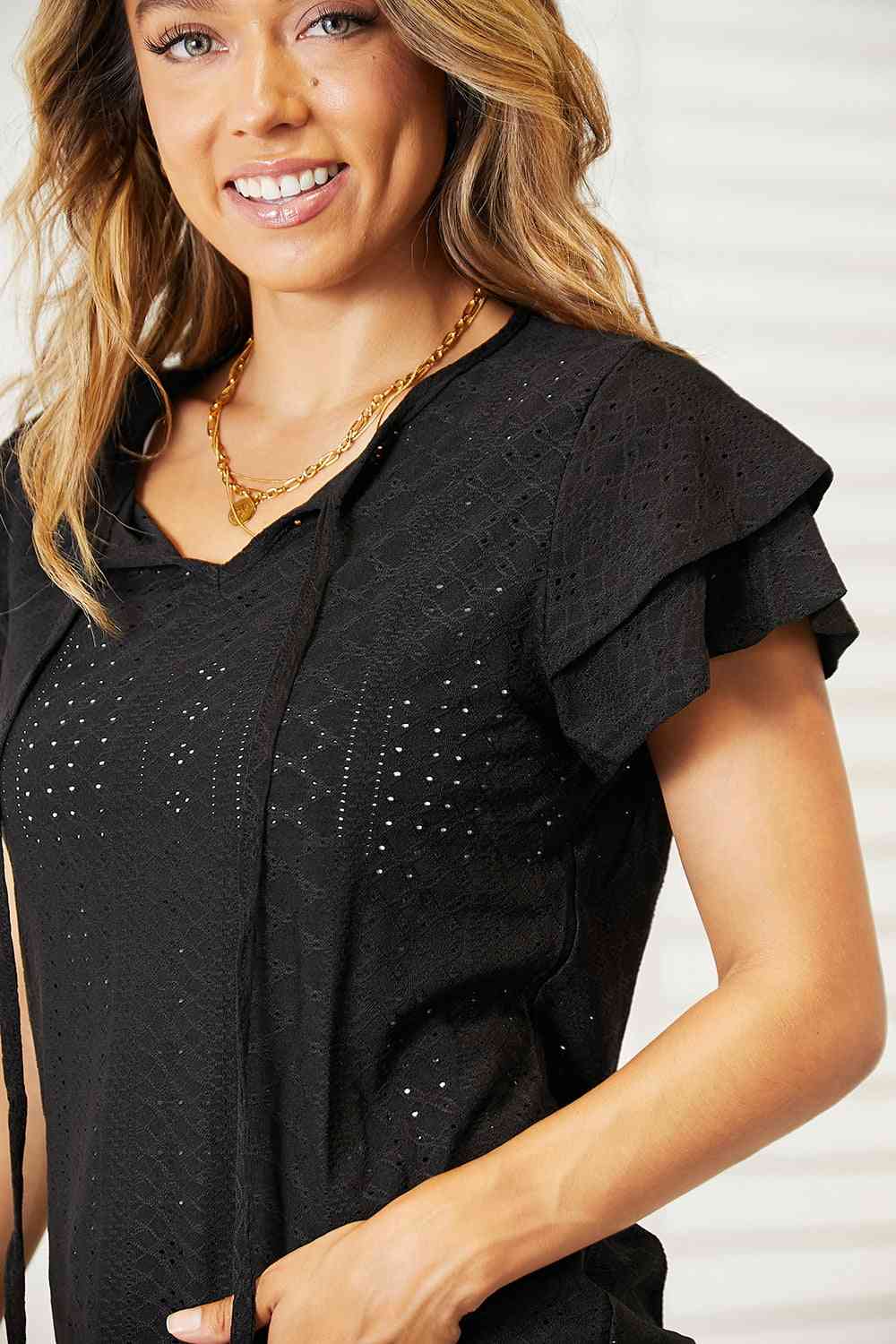 Double Take Eyelet Tie-Neck Flutter Sleeve Blouse